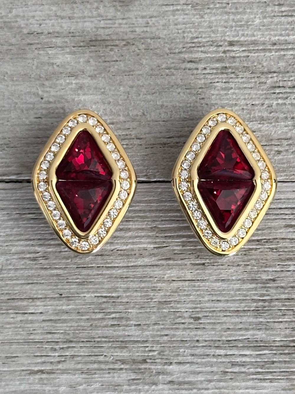 Vintage S.A.L. Swarovski America Ltd Ruby Red Crystal Clip On Earrings Gold Tone